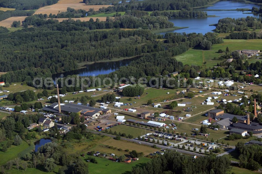 Aerial image Zehdenick - Mildenberg brick work park in the town area of Zehdenick in the state of Brandenburg. The park is an industrial memorial, surrounded by lakes and ponds. The compound consists of the company sites of two former brick works and is located in the North of the Mildenberg part of the town