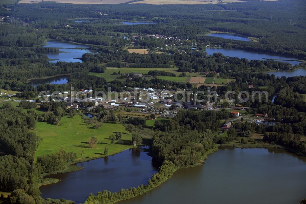 Aerial photograph Zehdenick - Mildenberg brick work park in the town area of Zehdenick in the state of Brandenburg. The park is an industrial memorial, surrounded by lakes and ponds. The compound consists of the company sites of two former brick works and is located in the North of the Mildenberg part of the town