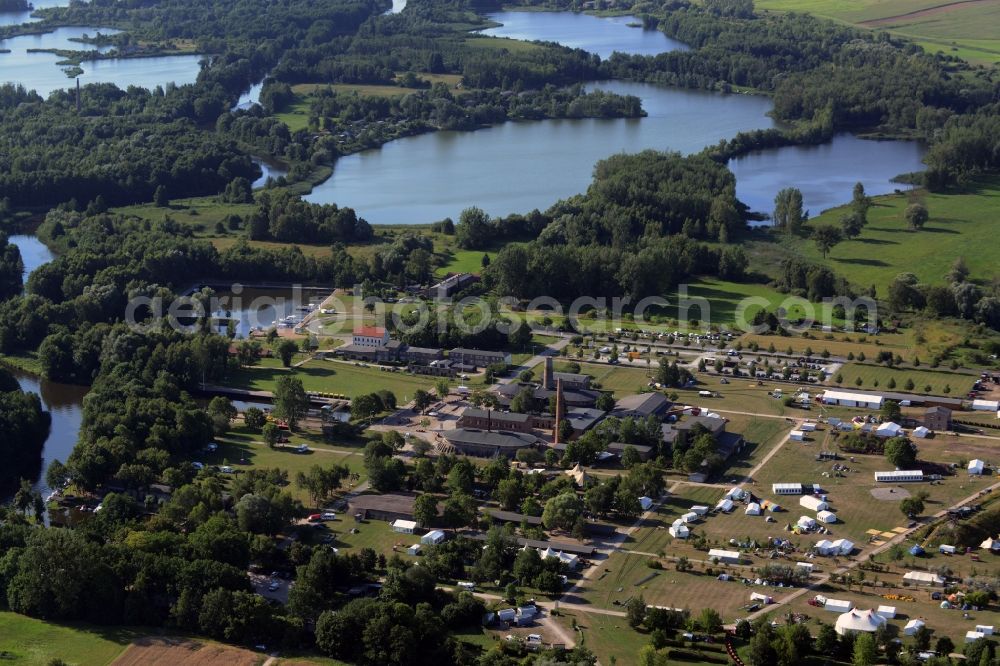 Zehdenick from the bird's eye view: Mildenberg brick work park in the town area of Zehdenick in the state of Brandenburg. The park is an industrial memorial, surrounded by lakes and ponds. The compound consists of the company sites of two former brick works and is located in the North of the Mildenberg part of the town