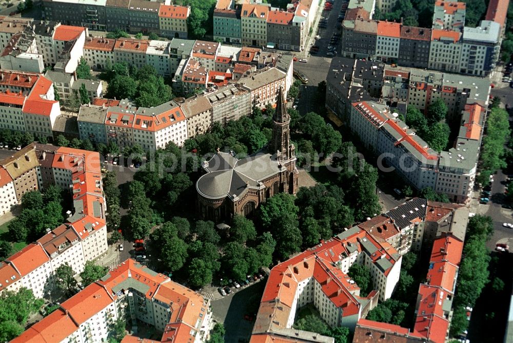 Aerial image Berlin - The Zionskirchplatz in Berlin-Mitte is named and is architecturally dominated by the Church of Zion. The church was built to designs by the architect August Orth over a hundred years ago in the Romanesque Revival style. The church has been the home of the representatives of the Confessing Church, Dietrich Bonhoeffer. End of 1980th years the church was known by vigils against the East German regime