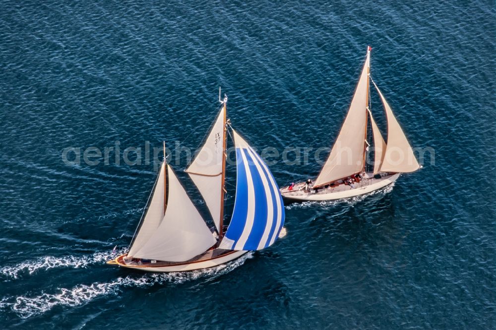 Glücksburg from above - Two sailing yachts in motion on the Flensburg Fjord in Gluecksburg in the state Schleswig-Holstein, Germany