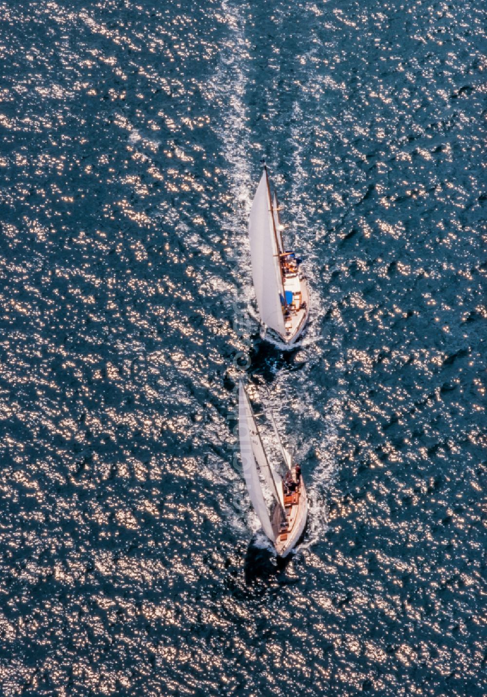 Aerial image Glücksburg - Two sailing yachts in motion on the Flensburg Fjord in Gluecksburg in the state Schleswig-Holstein, Germany