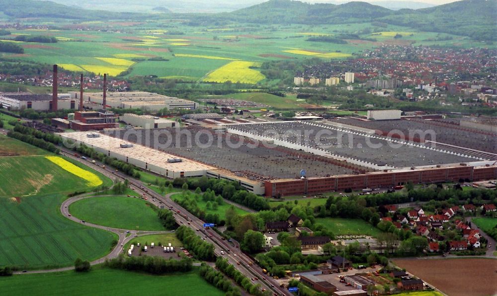 Aerial image Baunatal - Branch factory of Volkswagen AG in Baunatal in Hesse. This branch factory of Volkswagen AG was built in 1957 and is located near the highway 49th. The branch plant is the second largest manufacturing plant in the VW Group. Also seen in the picture the foothills of the Habichtswald