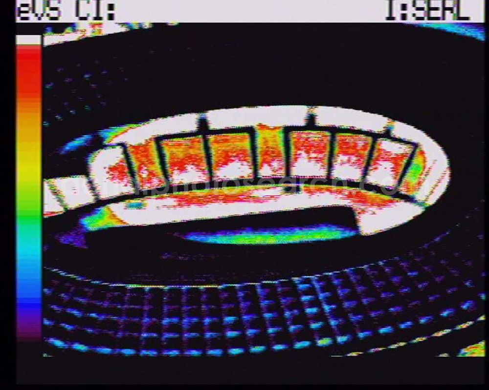 Infrared aerial photograph Berlin - Wärmeluftbild (Infrarotaufnahme) Blick auf das neue Olympiastadion in Berlin-Charlottenburg. Über 76.000 Zuschauer haben im neuen, umgebauten Stadion nun Platz und auch die technischen Gegebenheiten sind auf dem neuesten Stand. Das hervorragend ausgestattete Pressezentrum (Telex, Fotolabor, Bildfunk) und die exzellenten Voraussetzungen für Bild- und Tontechnik machen das Berliner Olympiastadion zu einer idealen Austragungsstätte für Sportveranstaltungen auf nationaler und internationaler Ebene. Auch für den Zuschauer hat das Stadion einiges zu bieten. Alle 76.000 Sitzplätze sind überdacht. 243 Scheinwerfer am Dach und 154 Scheinwerfer an den 88 Meter hohen Masten liefern über 1.500 Lux Lichtleistung. Damit ist jederzeit eine sehr gute Ausleuchtung des gesamten Spielfeldes gewährleistet. Olympiastadion Olympischer Platz 3 14053 Berlin