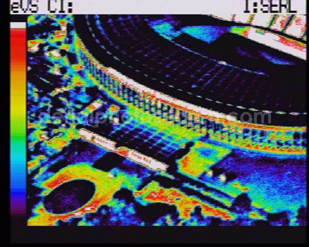 Infrared aerial photograph Berlin - Wärmeluftbild (Infrarotaufnahme) Blick auf das neue Olympiastadion in Berlin-Charlottenburg. Über 76.000 Zuschauer haben im neuen, umgebauten Stadion nun Platz und auch die technischen Gegebenheiten sind auf dem neuesten Stand. Das hervorragend ausgestattete Pressezentrum (Telex, Fotolabor, Bildfunk) und die exzellenten Voraussetzungen für Bild- und Tontechnik machen das Berliner Olympiastadion zu einer idealen Austragungsstätte für Sportveranstaltungen auf nationaler und internationaler Ebene. Auch für den Zuschauer hat das Stadion einiges zu bieten. Alle 76.000 Sitzplätze sind überdacht. 243 Scheinwerfer am Dach und 154 Scheinwerfer an den 88 Meter hohen Masten liefern über 1.500 Lux Lichtleistung. Damit ist jederzeit eine sehr gute Ausleuchtung des gesamten Spielfeldes gewährleistet. Olympiastadion Olympischer Platz 3 14053 Berlin