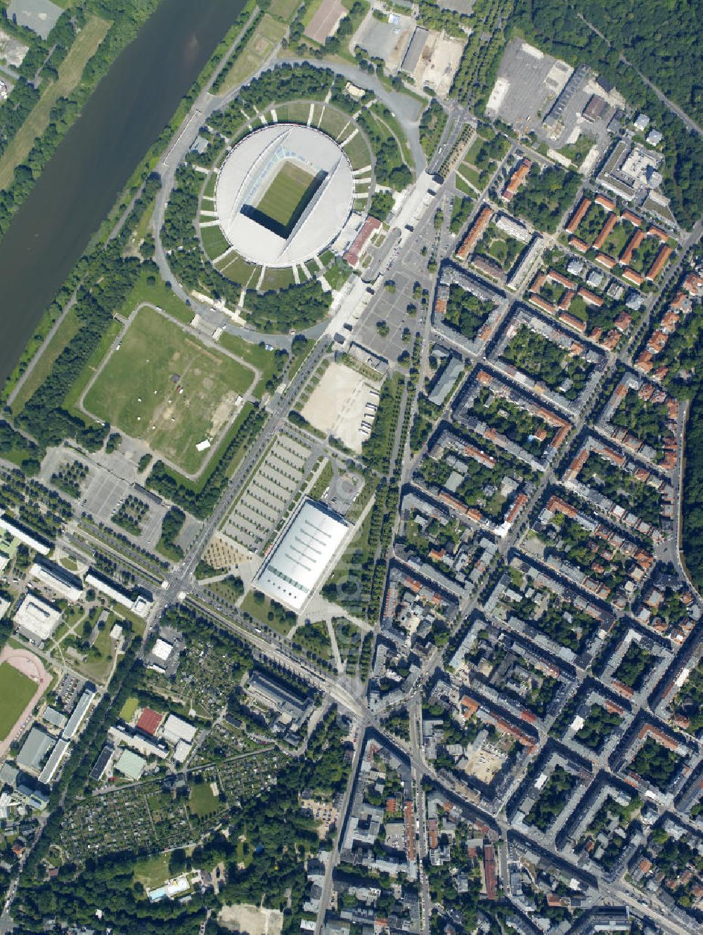 Vertical aerial photograph Leipzig - Senkrechtluftbild auf das Gelände des in Red Bull Arena umbenannten Zentralstadion. Es ist das größte Stadion Leipzigs und das größte auf dem Gebiet der Neuen Bundesländer. Es ist Teil des Leipziger Sportforums und liegt neben der neu gebauten Arena Leipzig. aerial photo on the grounds of the Red Bull Arena renamed in Zentralstadion. It is the largest stadium in Leipzig and the largest on the territory of the former East Germany. It is part of the Leipzig Sports Forum, located next to the newly built Arena Leipzig