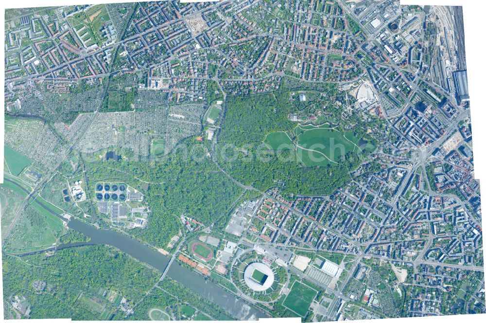 Vertical aerial photograph Leipzig - Vertical aerial view of the residential quarters of the forest road, the sewage treatment plant Rosenthal, in the grounds of the Red Bull Arena renamed the Central Stadium. It is the largest stadium in Leipzig and the largest in the area of ??former East Germany. It is part of the Leipzig Sports Forum and is adjacent to the newly built Arena Leipzig. Also pictured allotments Rosental and the new construction site of the Trophenhauses Gondwanaland in the Leipzig Zoo. In addition, the industrial and commercial area on the memory of the old gas station on the gas station