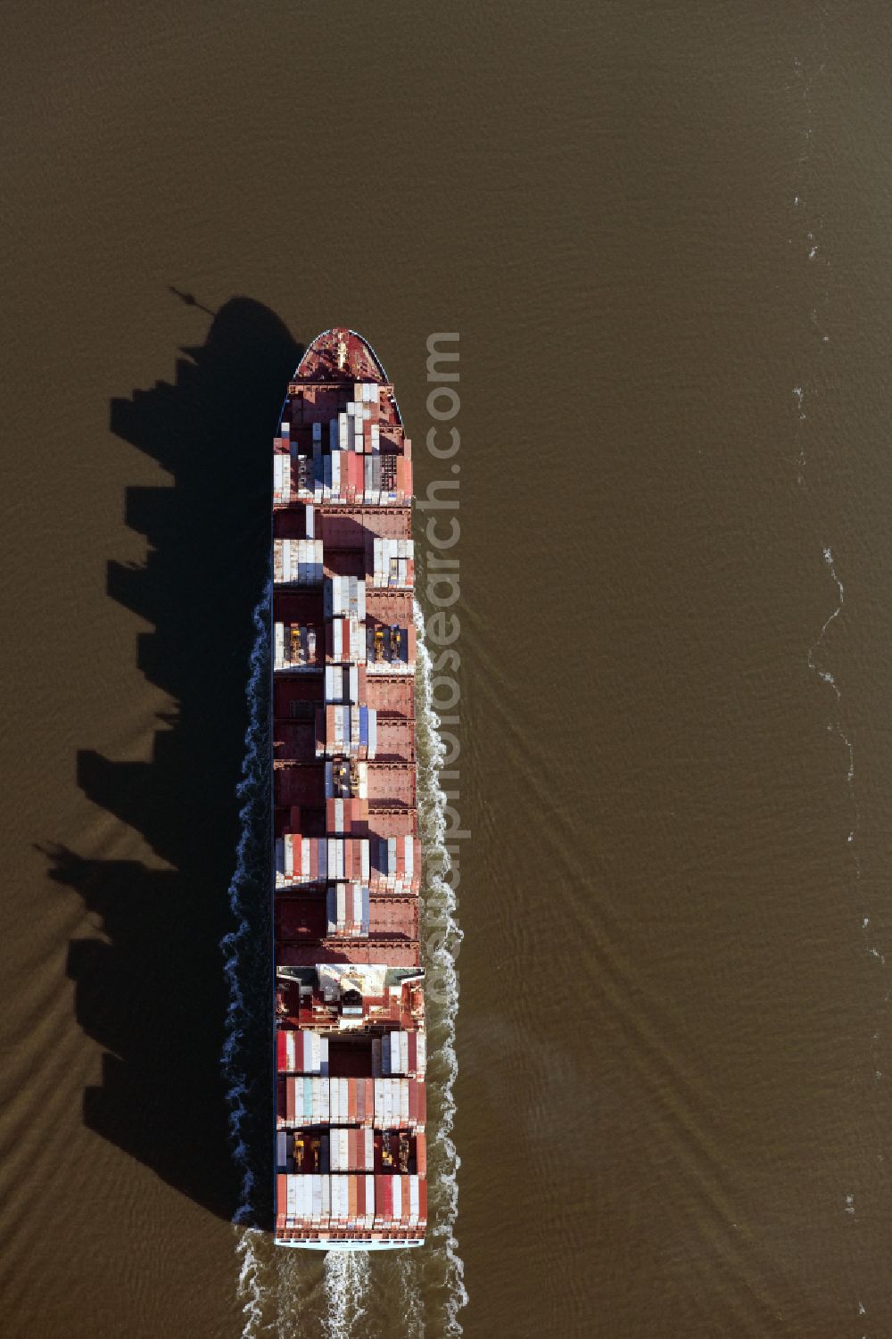 Vertical aerial photograph Bremerhaven - Vertical aerial view from the satellite perspective of the container ship on the Outer Weser in the Wadden Sea in Wurster North Sea Coast in the state Lower Saxony, Germany