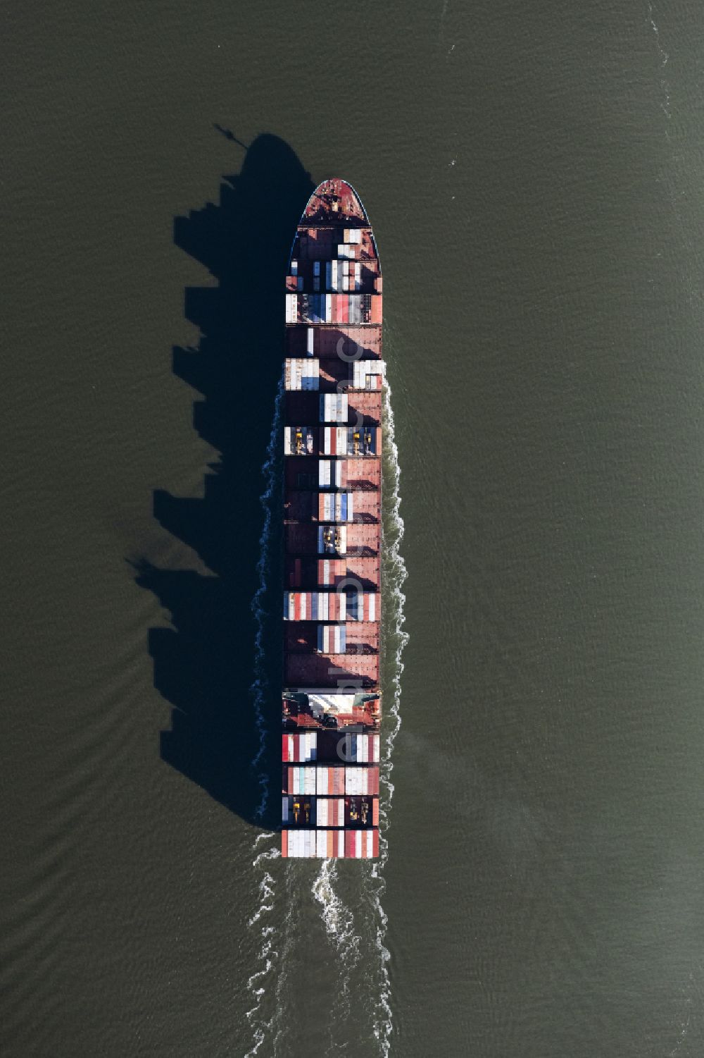 Vertical aerial photograph Bremerhaven - Vertical aerial view from the satellite perspective of the container ship on the Outer Weser in the Wadden Sea in Wurster North Sea Coast in the state Lower Saxony, Germany