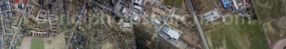 Vertical aerial photograph Bernau - Vertical aerial photo of the commercial areas Rehberge ans Schönow of Bernau. The new police station, the OBI building center, the GLS depot, and the sports ground of the football club FSV Bernau can be seen. On the left is the colony Am Kirschgarten