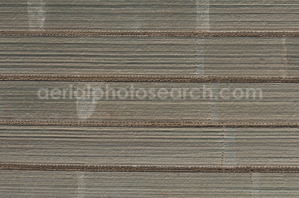 Vertical aerial photograph Pulheim - Vertical aerial view from the satellite perspective of a Field covered with plastic film in Pulheim in the state North Rhine-Westphalia, Germany