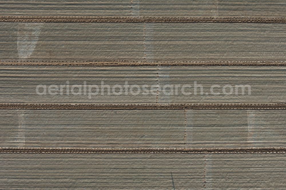 Vertical aerial photograph Pulheim - Vertical aerial view from the satellite perspective of a Field covered with plastic film in Pulheim in the state North Rhine-Westphalia, Germany