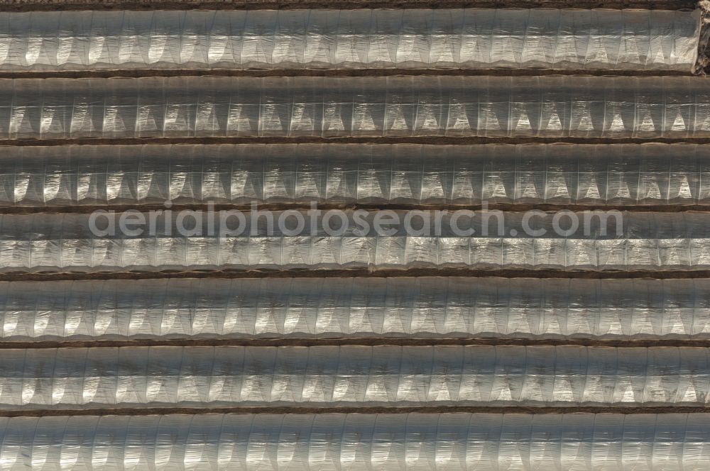 Vertical aerial photograph Pulheim - Vertical aerial view from the satellite perspective of a Field covered with plastic film in Pulheim in the state North Rhine-Westphalia, Germany