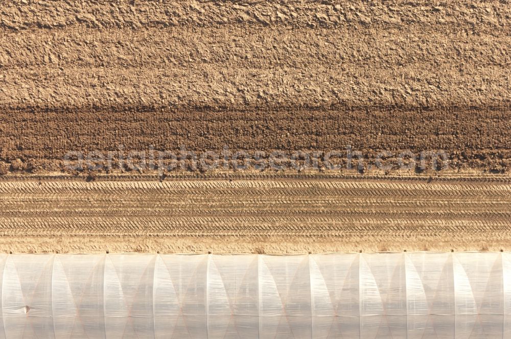 Vertical aerial photograph Pulheim - Vertical aerial view from the satellite perspective of a Field covered with plastic film in Pulheim in the state North Rhine-Westphalia, Germany