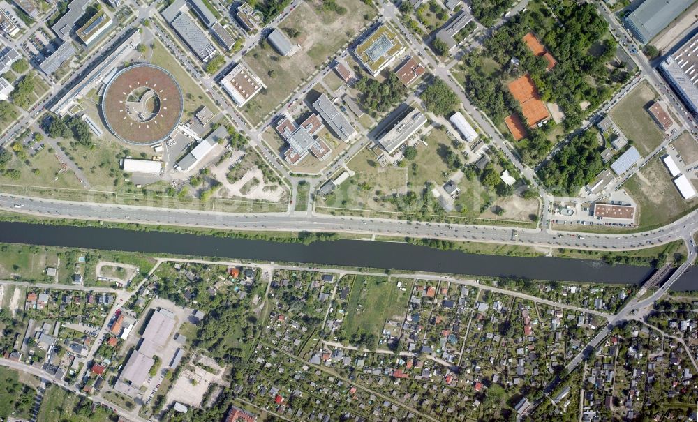 Vertical aerial photograph Berlin - Vertical aerial view from the satellite perspective of the research building and office complex Elektronen- Speicherring BESSY - Synchrotronstrahlungsquelle in the district Adlershof in Berlin, Germany