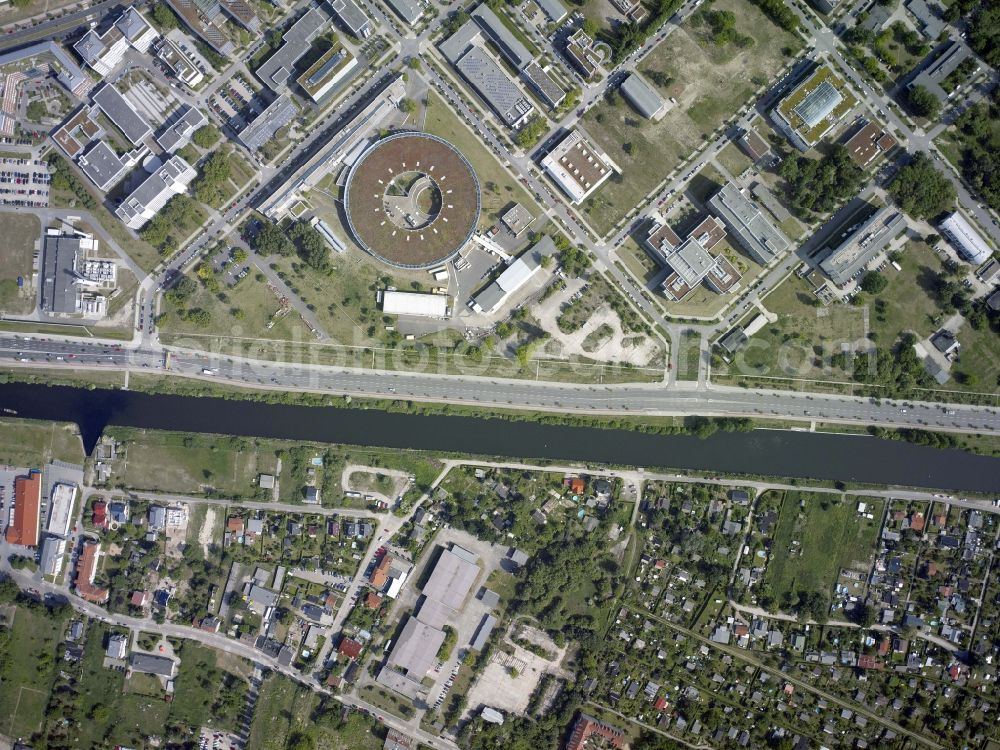 Vertical aerial photograph Berlin - Vertical aerial view from the satellite perspective of the research building and office complex Elektronen- Speicherring BESSY - Synchrotronstrahlungsquelle in the district Adlershof in Berlin, Germany