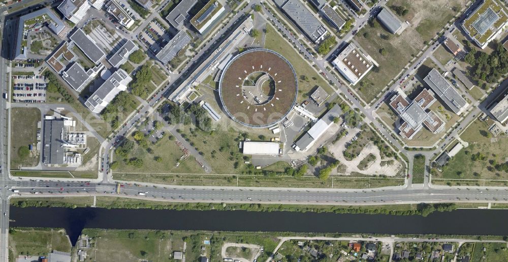 Vertical aerial photograph Berlin - Vertical aerial view from the satellite perspective of the research building and office complex Elektronen- Speicherring BESSY - Synchrotronstrahlungsquelle in the district Adlershof in Berlin, Germany