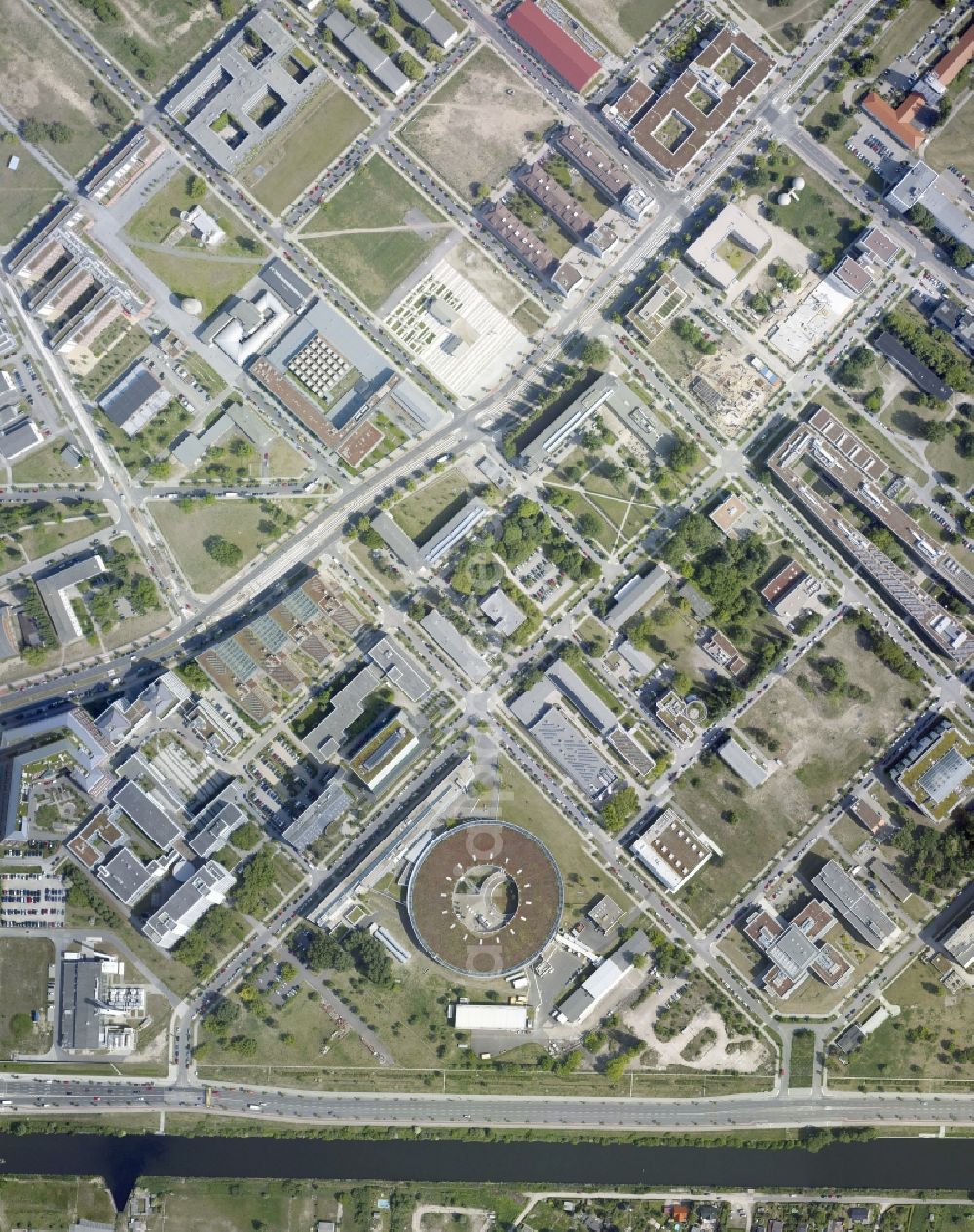 Vertical aerial photograph Berlin - Vertical aerial view from the satellite perspective of the research building and office complex Elektronen- Speicherring BESSY - Synchrotronstrahlungsquelle in the district Adlershof in Berlin, Germany