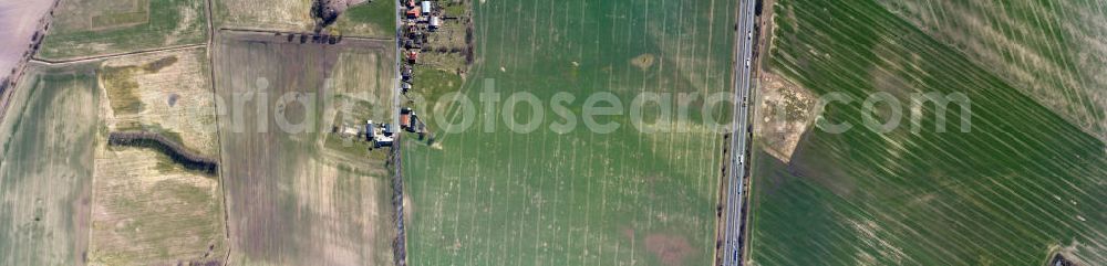 Vertical aerial photograph Bernau - Vertical aerial photo of some family homes and properties of the hamlet Birkholz, which is a local district of the town of Bernau. It is close to the motor way A 11 and surrounded by fields and marsh areas