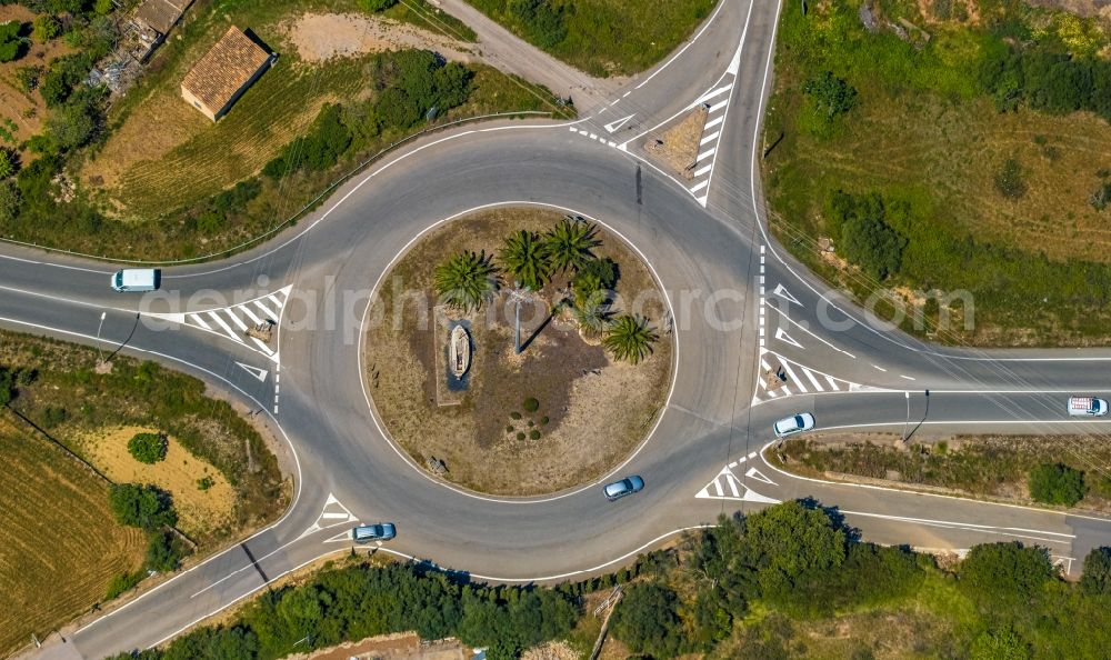 Vertical aerial photograph Capdepera - Vertical aerial view from the satellite perspective of the traffic management of the roundabout road of the roads of Ma-15 - Carrer Nord - Carrer Major in Capdepera in Balearische Insel Mallorca, Spain