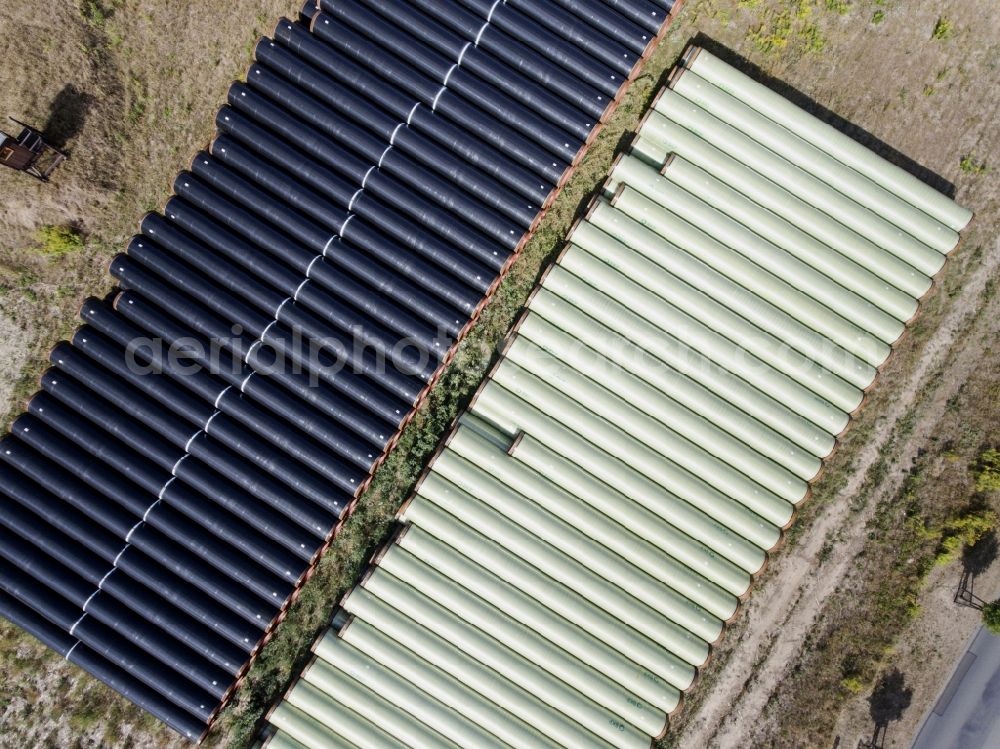 Vertical aerial photograph Bindow - Vertical aerial view from the satellite perspective of the storage yard of pipeline of the EUGAL route near Bindow in the state of Brandenburg, Germany