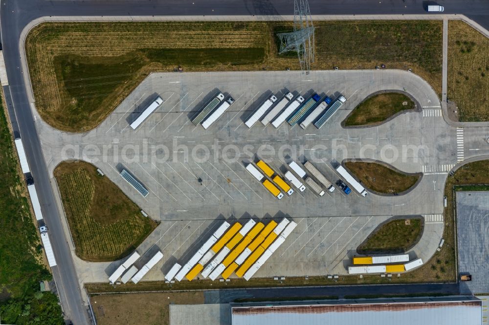 Vertical aerial photograph Werne - Vertical aerial view from the satellite perspective of the lorries and Truck storage areas and free-standing storage on Carl-Zeiss-Strasse in Werne in the state North Rhine-Westphalia, Germany