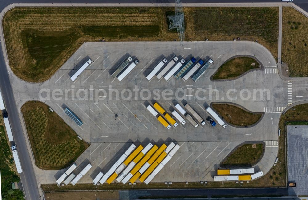 Vertical aerial photograph Werne - Vertical aerial view from the satellite perspective of the lorries and Truck storage areas and free-standing storage on Carl-Zeiss-Strasse in Werne in the state North Rhine-Westphalia, Germany