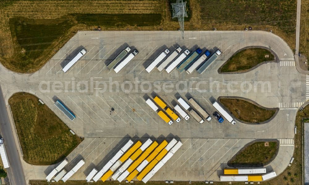 Vertical aerial photograph Werne - Vertical aerial view from the satellite perspective of the lorries and Truck storage areas and free-standing storage on Carl-Zeiss-Strasse in Werne in the state North Rhine-Westphalia, Germany