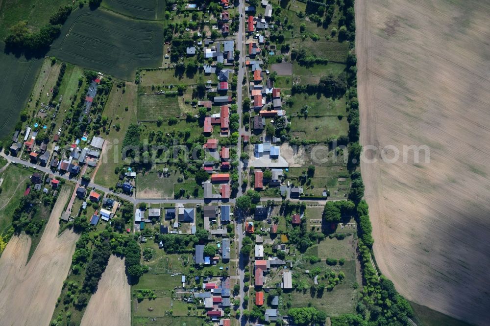 Vertical aerial photograph Werbellin - Vertical aerial view from the satellite perspective of the village view on the edge of agricultural fields and land in Werbellin in the state Brandenburg, Germany