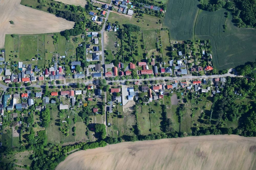 Vertical aerial photograph Werbellin - Vertical aerial view from the satellite perspective of the village view on the edge of agricultural fields and land in Werbellin in the state Brandenburg, Germany