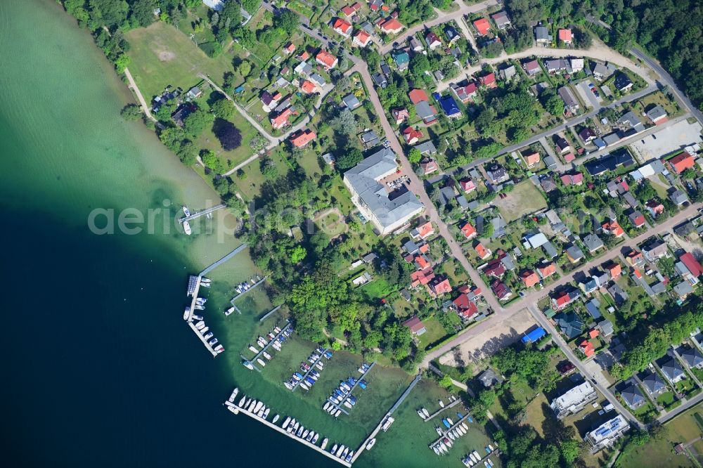 Vertical aerial photograph Altenhof - Vertical aerial view from the satellite perspective of the village on the banks of the area on Ufer of Werbellinsee in Altenhof in the state Brandenburg, Germany