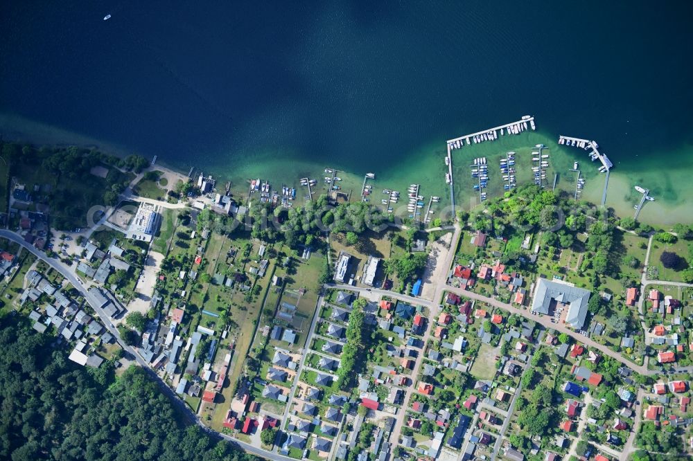 Vertical aerial photograph Altenhof - Vertical aerial view from the satellite perspective of the village on the banks of the area on Ufer of Werbellinsee in Altenhof in the state Brandenburg, Germany