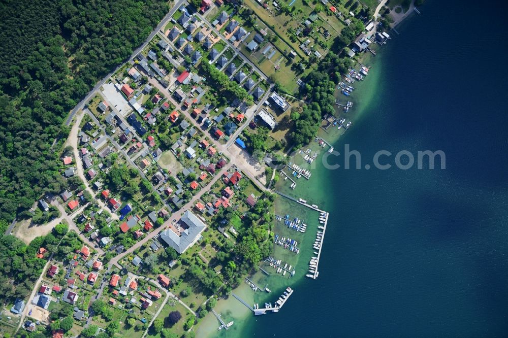 Vertical aerial photograph Altenhof - Vertical aerial view from the satellite perspective of the village on the banks of the area on Ufer of Werbellinsee in Altenhof in the state Brandenburg, Germany