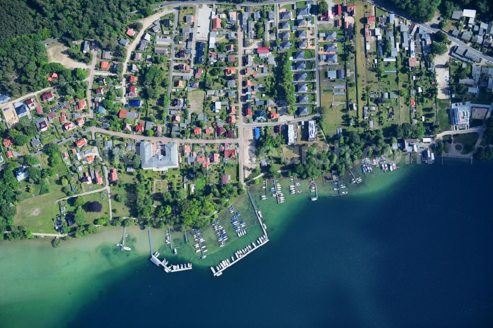 Vertical aerial photograph Altenhof - Vertical aerial view from the satellite perspective of the village on the banks of the area on Ufer of Werbellinsee in Altenhof in the state Brandenburg, Germany