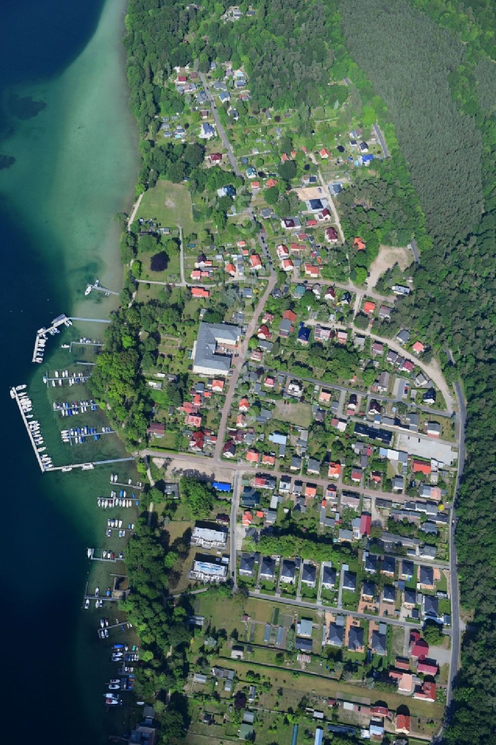 Vertical aerial photograph Altenhof - Vertical aerial view from the satellite perspective of the village on the banks of the area on Ufer of Werbellinsee in Altenhof in the state Brandenburg, Germany