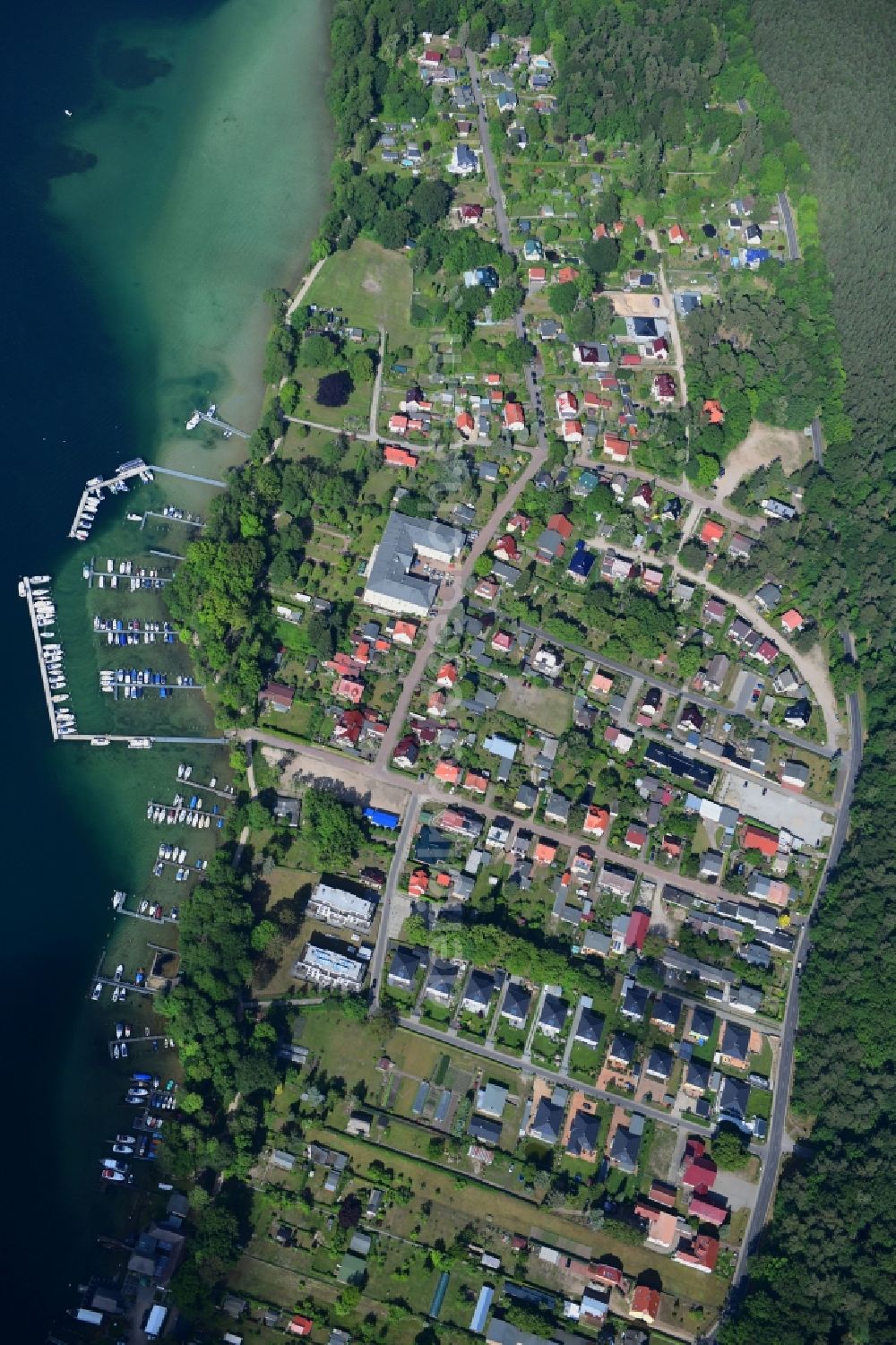 Vertical aerial photograph Altenhof - Vertical aerial view from the satellite perspective of the village on the banks of the area on Ufer of Werbellinsee in Altenhof in the state Brandenburg, Germany