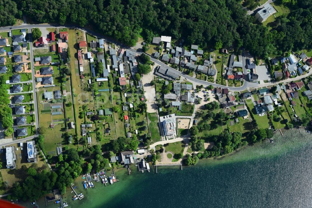 Vertical aerial photograph Altenhof - Vertical aerial view from the satellite perspective of the village on the banks of the area of Werbellinsee in Altenhof in the state Brandenburg, Germany