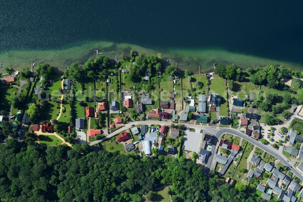 Vertical aerial photograph Altenhof - Vertical aerial view from the satellite perspective of the village on the banks of the area of Werbellinsee in Altenhof in the state Brandenburg, Germany