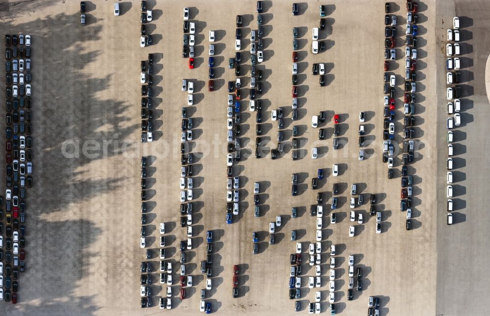 Vertical aerial photograph Dickel - Vertical aerial view from the satellite perspective of the parking and storage space for automobiles in Dickel in the state Lower Saxony, Germany