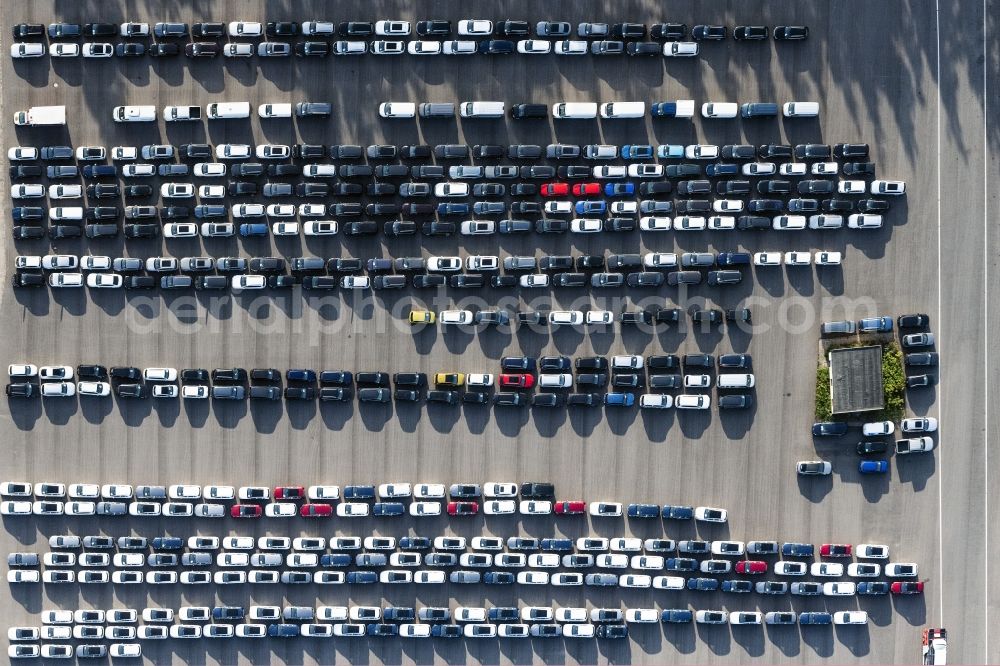 Vertical aerial photograph Dickel - Vertical aerial view from the satellite perspective of the parking and storage space for automobiles in Dickel in the state Lower Saxony, Germany