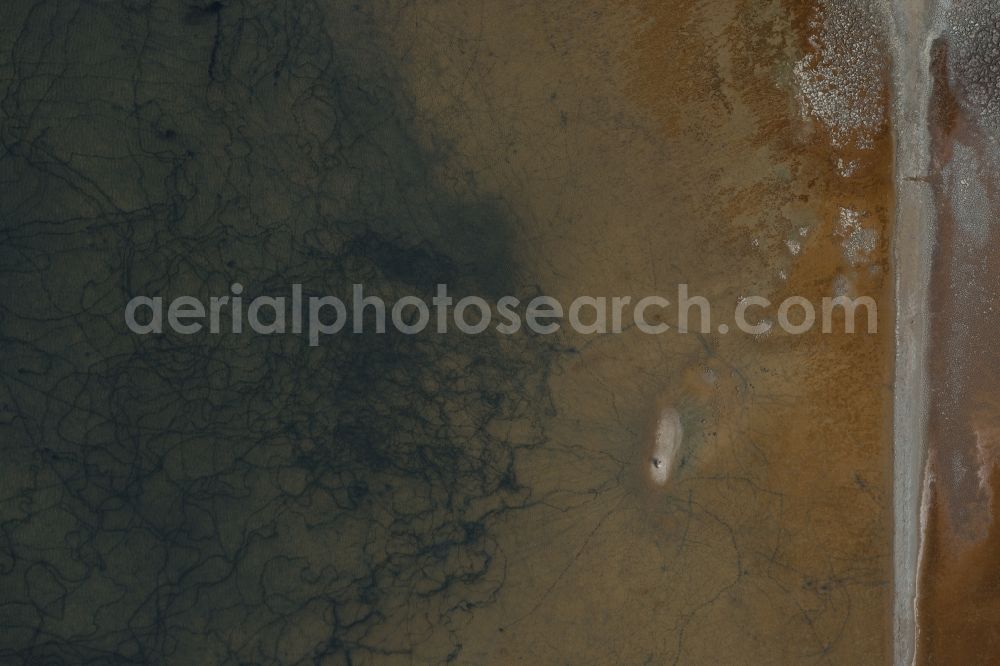 Vertical aerial photograph Llucmajor - Vertical aerial view from the satellite perspective of the Brown - white salt pans for salt extraction in the district Ses Salines in Llucmajor in Balearic Islands, Spain