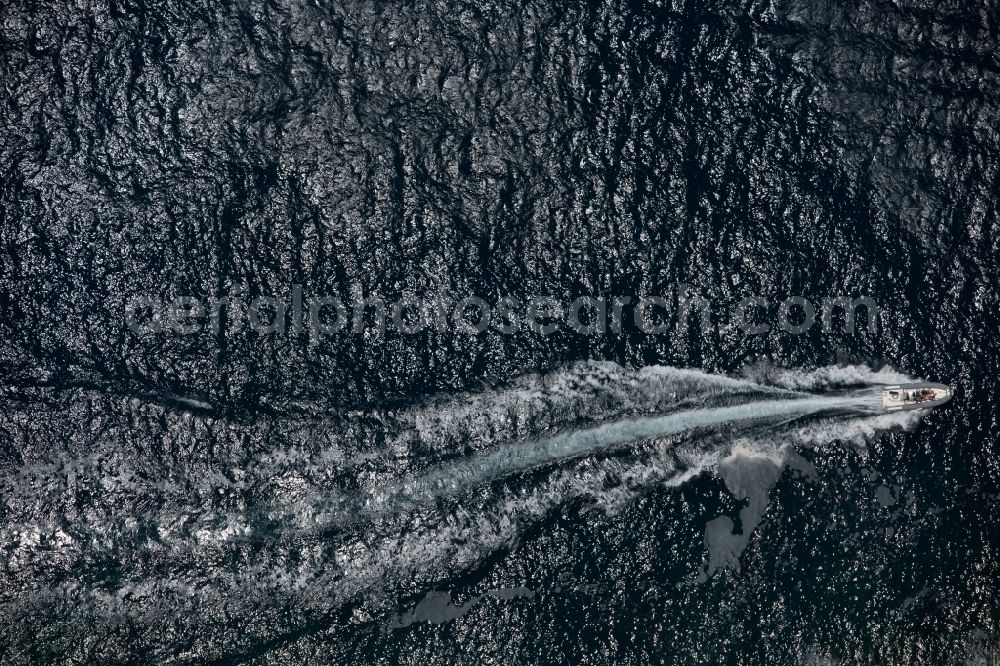 Vertical aerial photograph Andratx - Vertical aerial view from the satellite perspective of the Sailboat under way offshore in Andratx in Balearic Islands, Spain