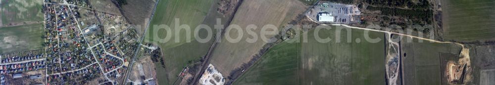 Vertical aerial photograph Bernau - Vertical Aerial photo of the Nibelungen district of Bernau. The Albertshofer Avenue with its quarry enterprise and the Rüdnitzer Avenue are close on in the railroad tracks of the regional train