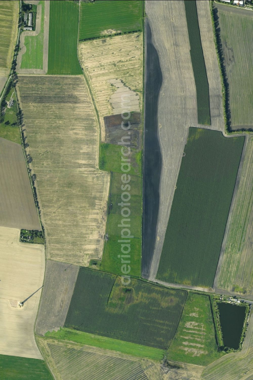 Vertical aerial photograph Bredow - Vertical aerial view from the satellite perspective of the structures on agricultural fields in Bredow in the state Brandenburg, Germany