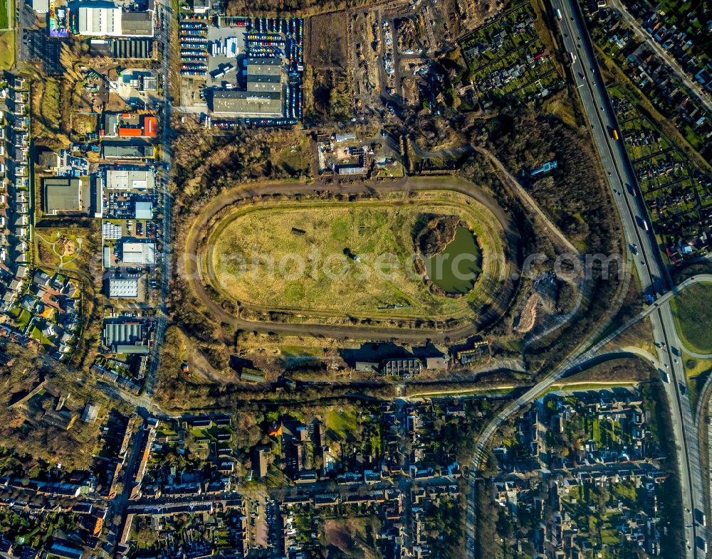 Vertical aerial photograph Recklinghausen - Vertical aerial view from the satellite perspective of the Development, demolition and renovation work on the site of the former racing track - harness racing track as part of the integrated district development concept (ISEK) Hillerheide in Recklinghausen at Ruhrgebiet in the state of North Rhine-Westphalia, Germany