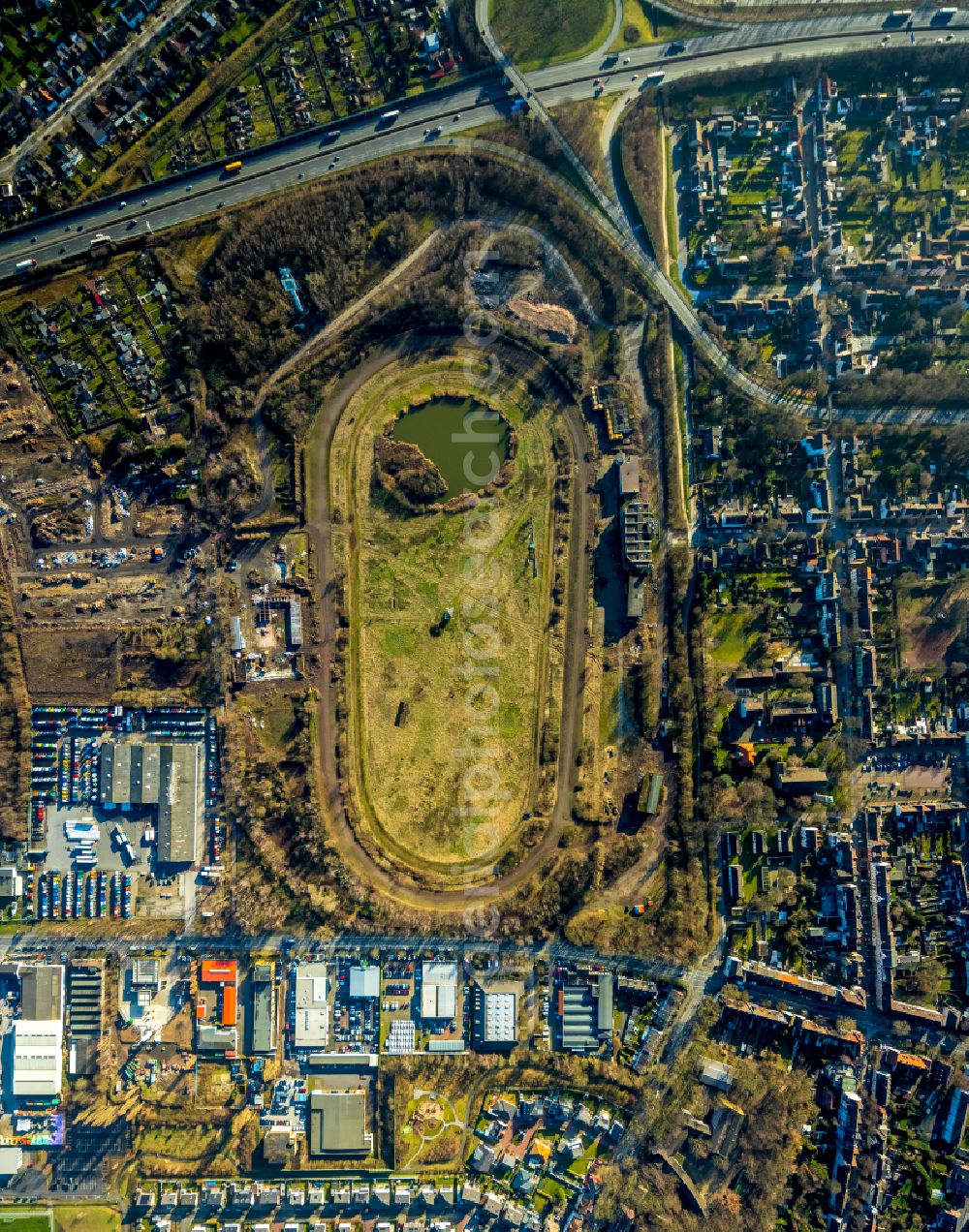 Vertical aerial photograph Recklinghausen - Vertical aerial view from the satellite perspective of the Development, demolition and renovation work on the site of the former racing track - harness racing track as part of the integrated district development concept (ISEK) Hillerheide in Recklinghausen at Ruhrgebiet in the state of North Rhine-Westphalia, Germany