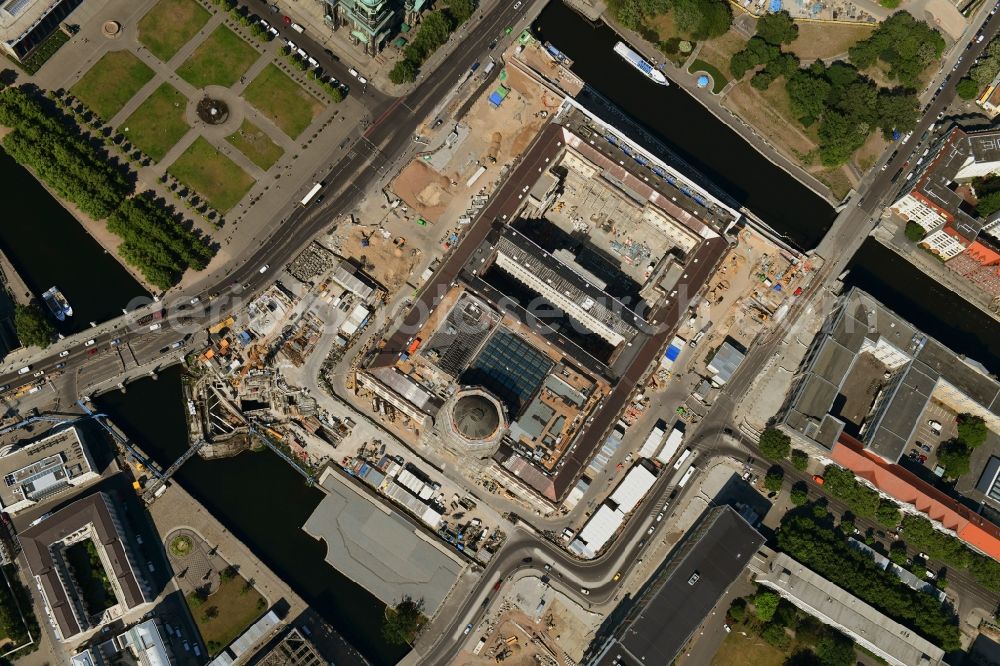 Vertical aerial photograph Berlin - Vertical aerial view from the satellite perspective of the construction site for the new building the largest and most important cultural construction of the Federal Republic, the building of the Humboldt Forum in the form of the Berlin Palace