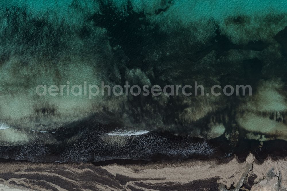 Vertical aerial photograph Llucmajor - Vertical aerial view from the satellite perspective of the Water surface at the seaside of mediteran sea in Llucmajor, beach es Trenc in Balearic Islands, Spain