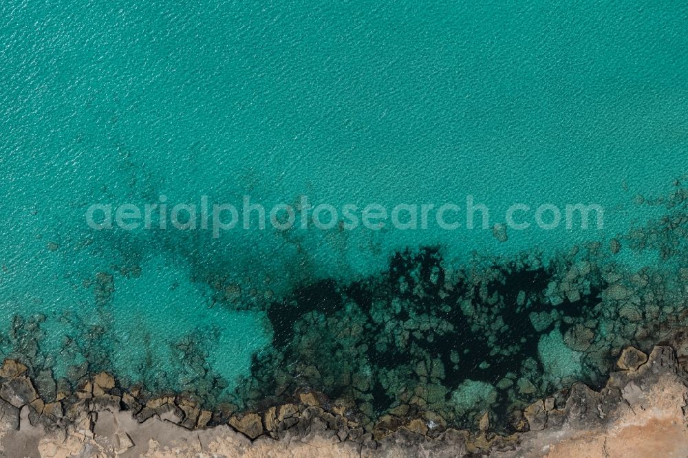 Vertical aerial photograph Llucmajor - Vertical aerial view from the satellite perspective of the Water surface at the seaside of mediteran sea in Llucmajor, beach es Trenc in Balearic Islands, Spain