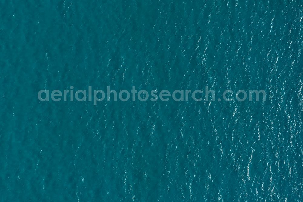 Vertical aerial photograph Llucmajor - Vertical aerial view from the satellite perspective of the Water surface at the seaside of mediteran sea in Llucmajor, beach es Trenc in Balearic Islands, Spain